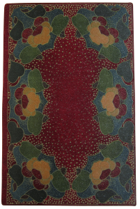 Indian Fairy Tales designed and executed by Miss Lilian Overton.  Red morocco, inlaid floral design, consisting of 250 pieces of green, blue, red and yellow leather. 
